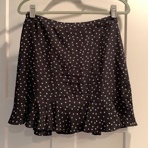Black mini skirt with off white stars